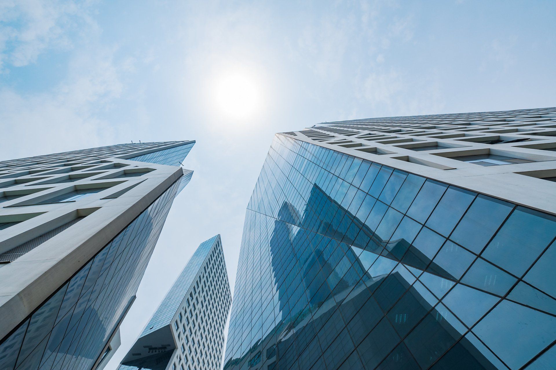 A woman signing a paper | Melbourne, VIC | Menzies Advisory