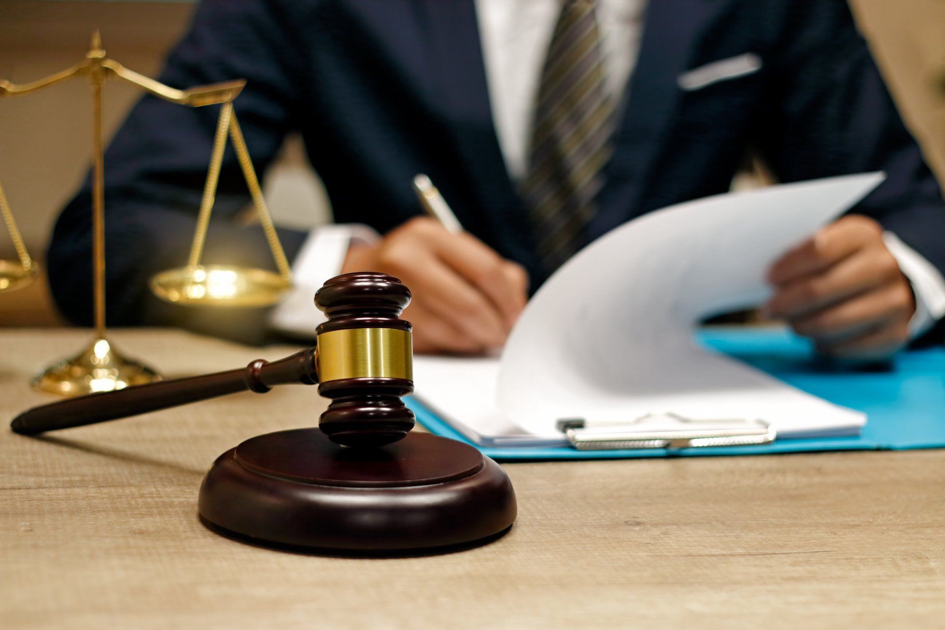 A person writing on a piece of paper | Melbourne, VIC | Menzies Advisory