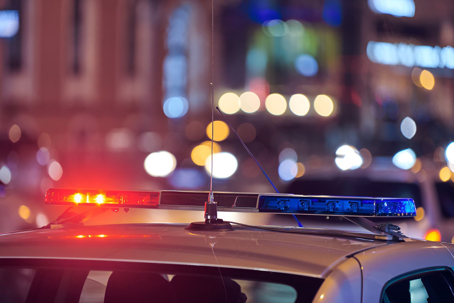 A Police Car With A Beacon — Cairns Criminal Lawyers In Redlynch, QLD