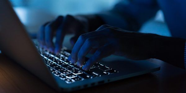 Typing On Laptop Keyboard — Cairns Criminal Lawyers In Cairns City, QLD