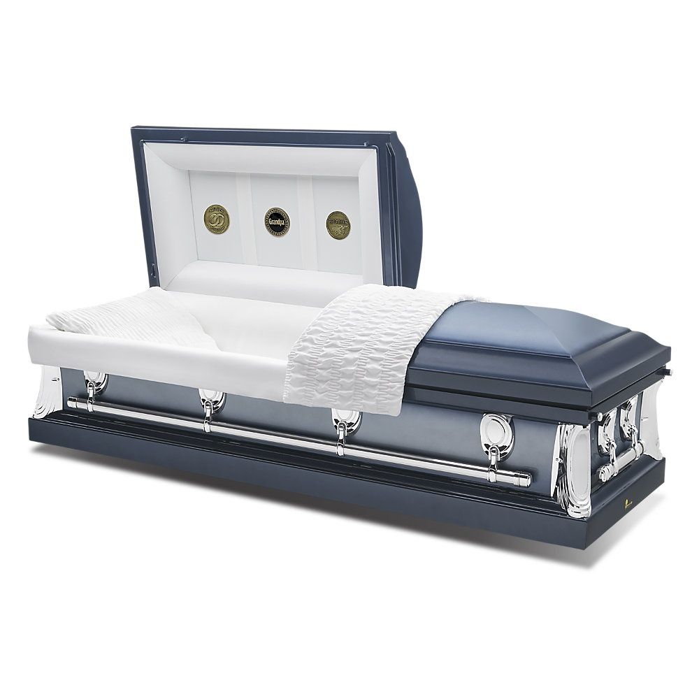 Blue and silver open casket with white satin lining on a white background
