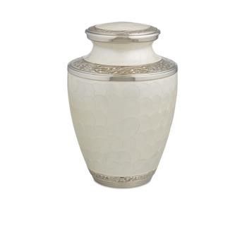 White decorative ceramic urn with silver accents on a plain background