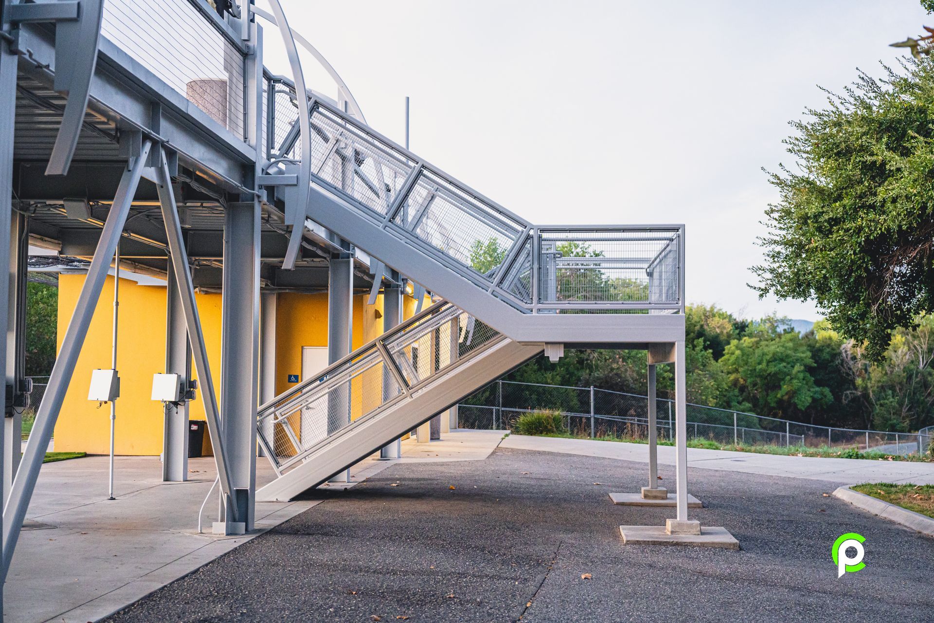A set of metal stairs leading up to a building.