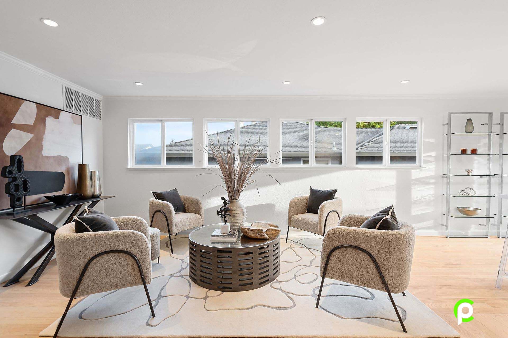 A living room with two chairs and a coffee table