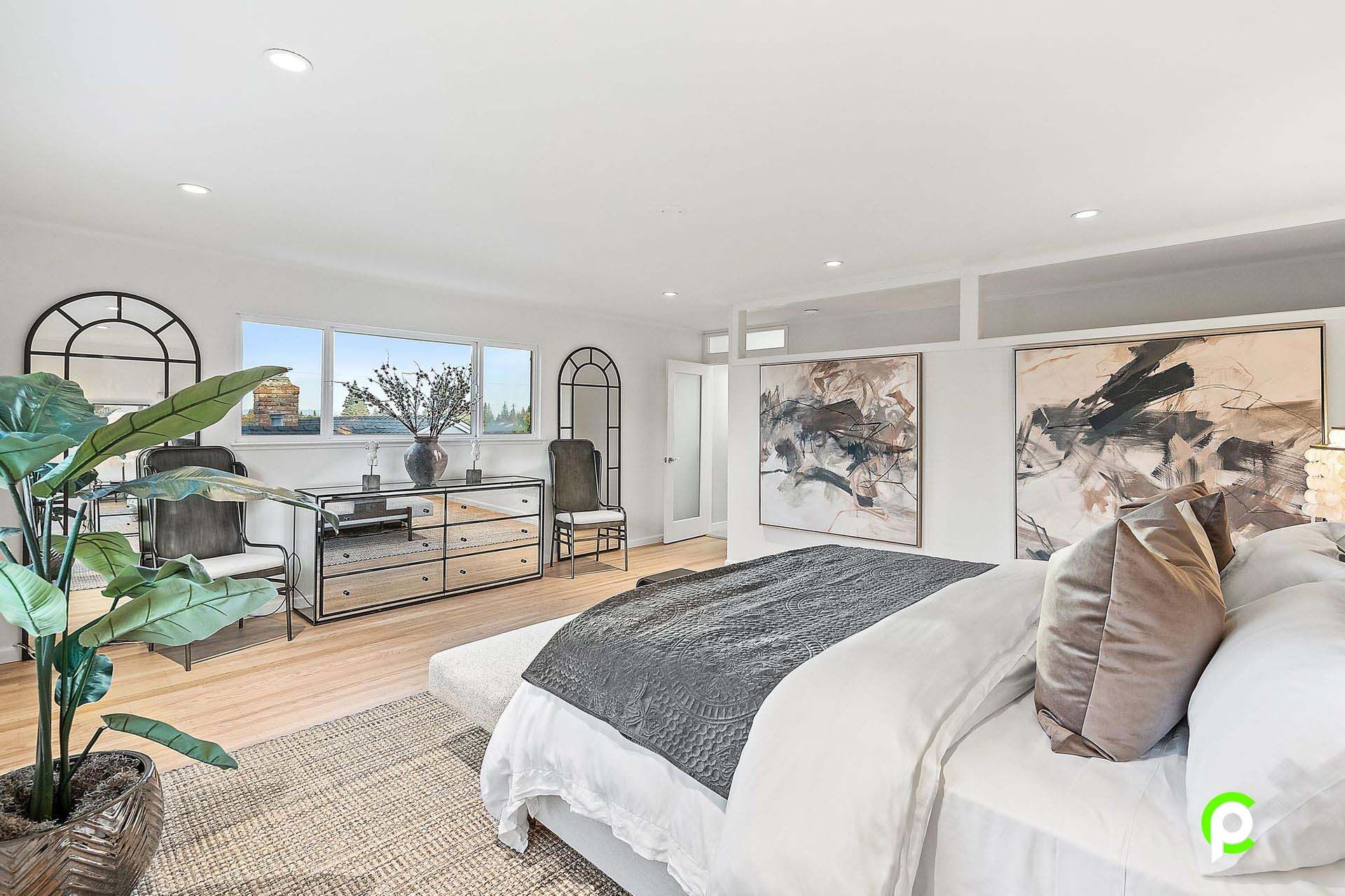 There is a large bed in the middle of the room.