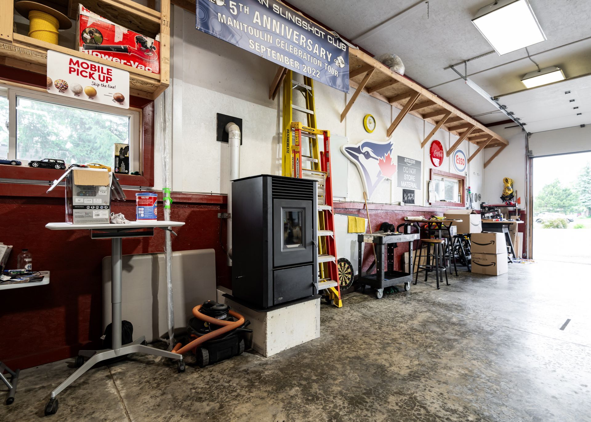 A workshop with a sign that says ' anniversary ' on it
