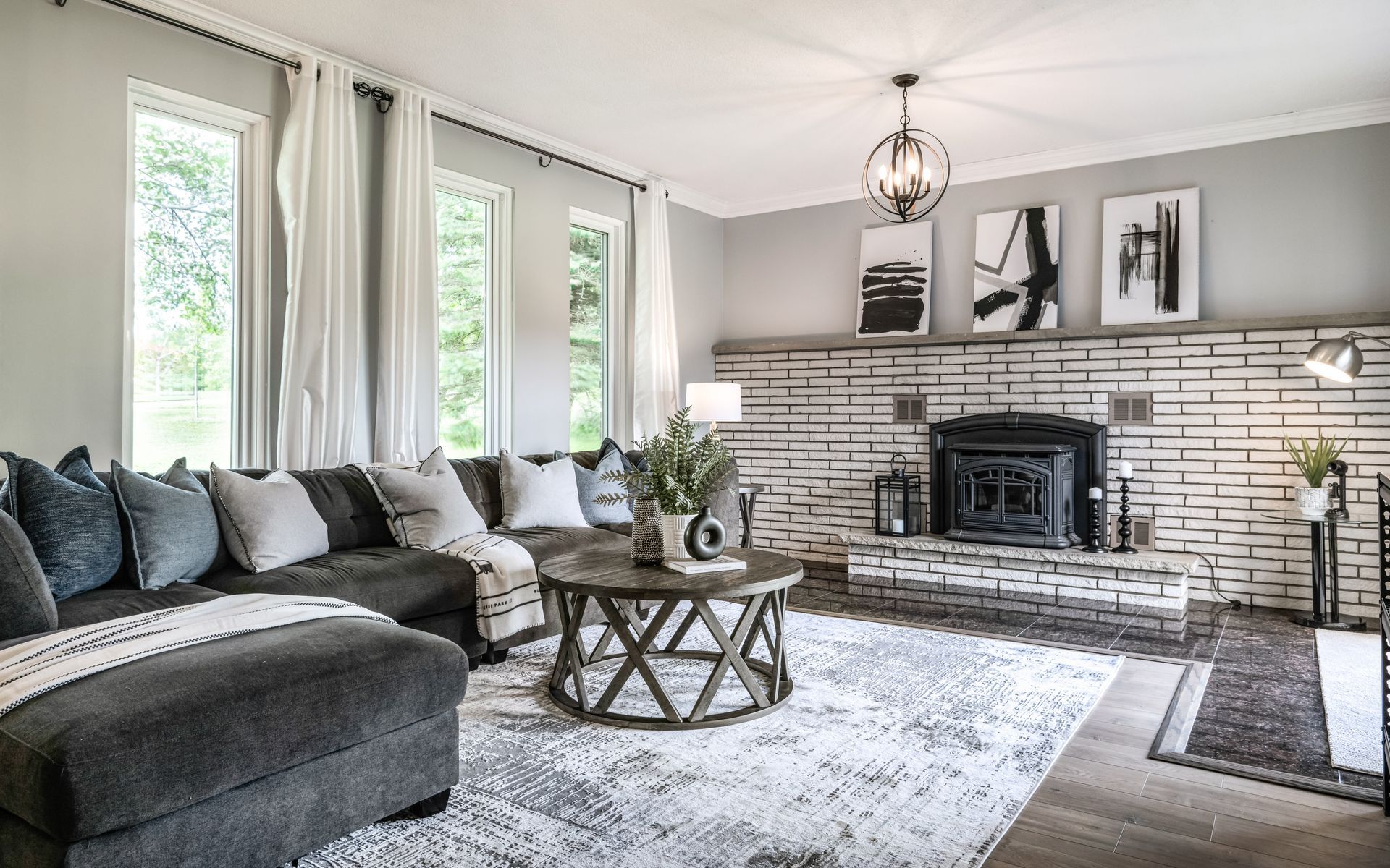 A living room filled with furniture and a fireplace.