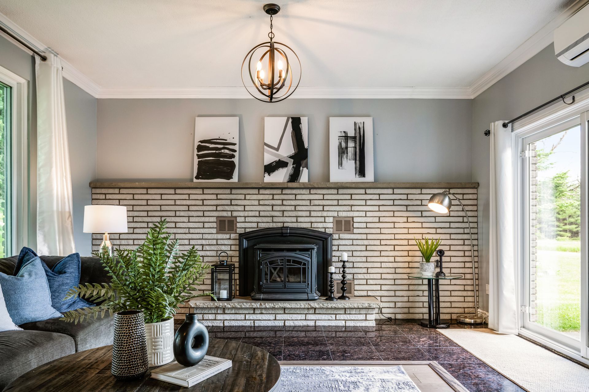 A living room with a fireplace and a couch