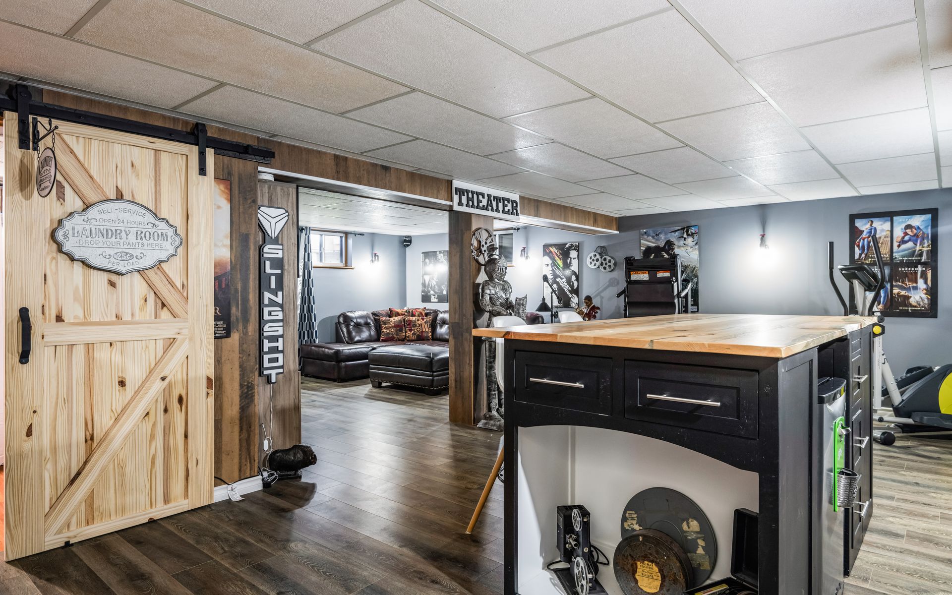 There is a sliding barn door in the middle of the room.