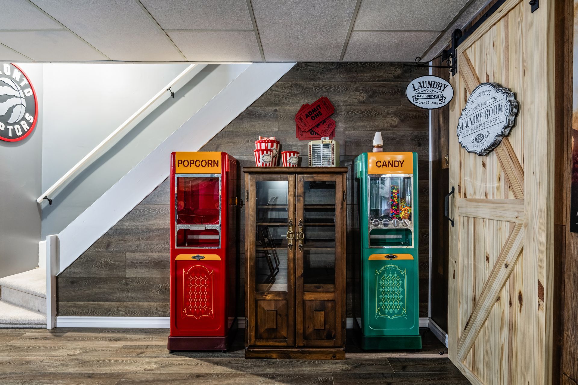 Two popcorn machines are sitting next to each other in a room.
