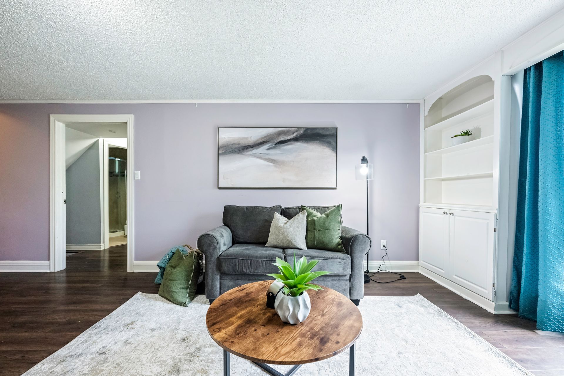 A living room with a couch and a coffee table