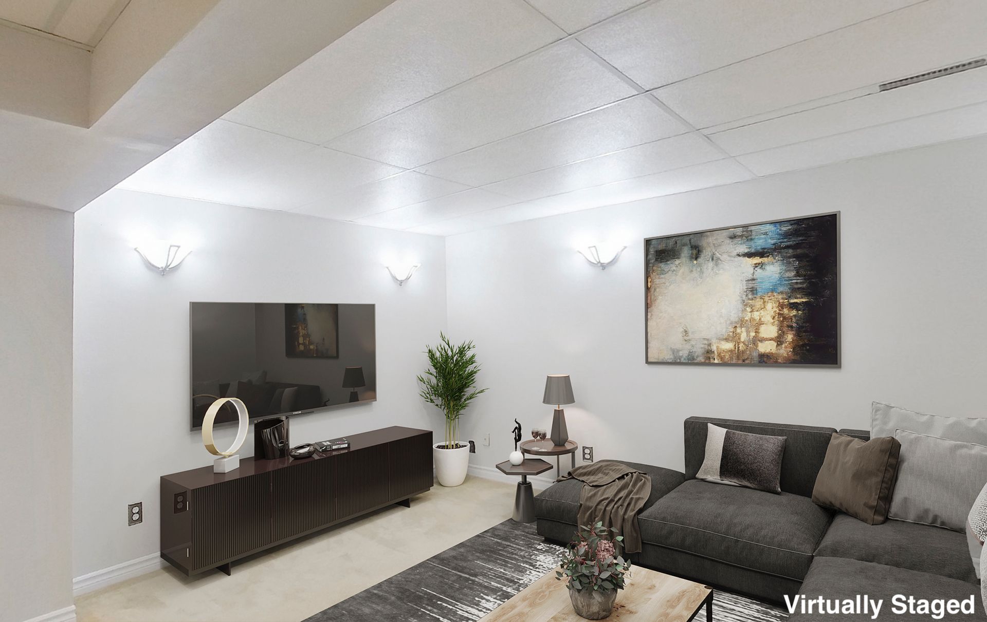 A living room with a couch and a flat screen tv