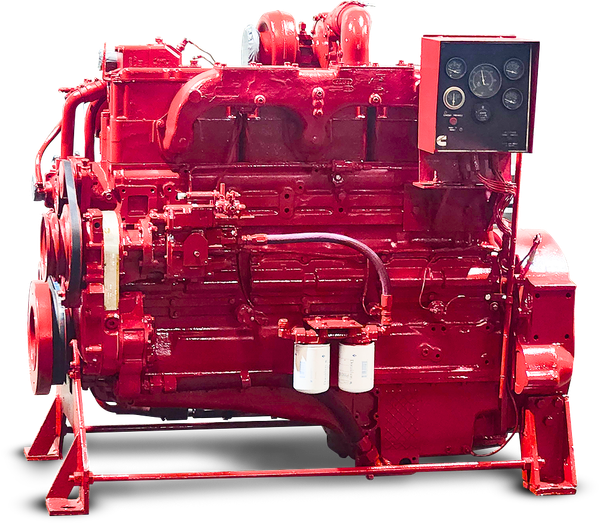Red industrial engine or generator unit painted bright red, with control panel and gauges on the right. | S&V Diesel Repair