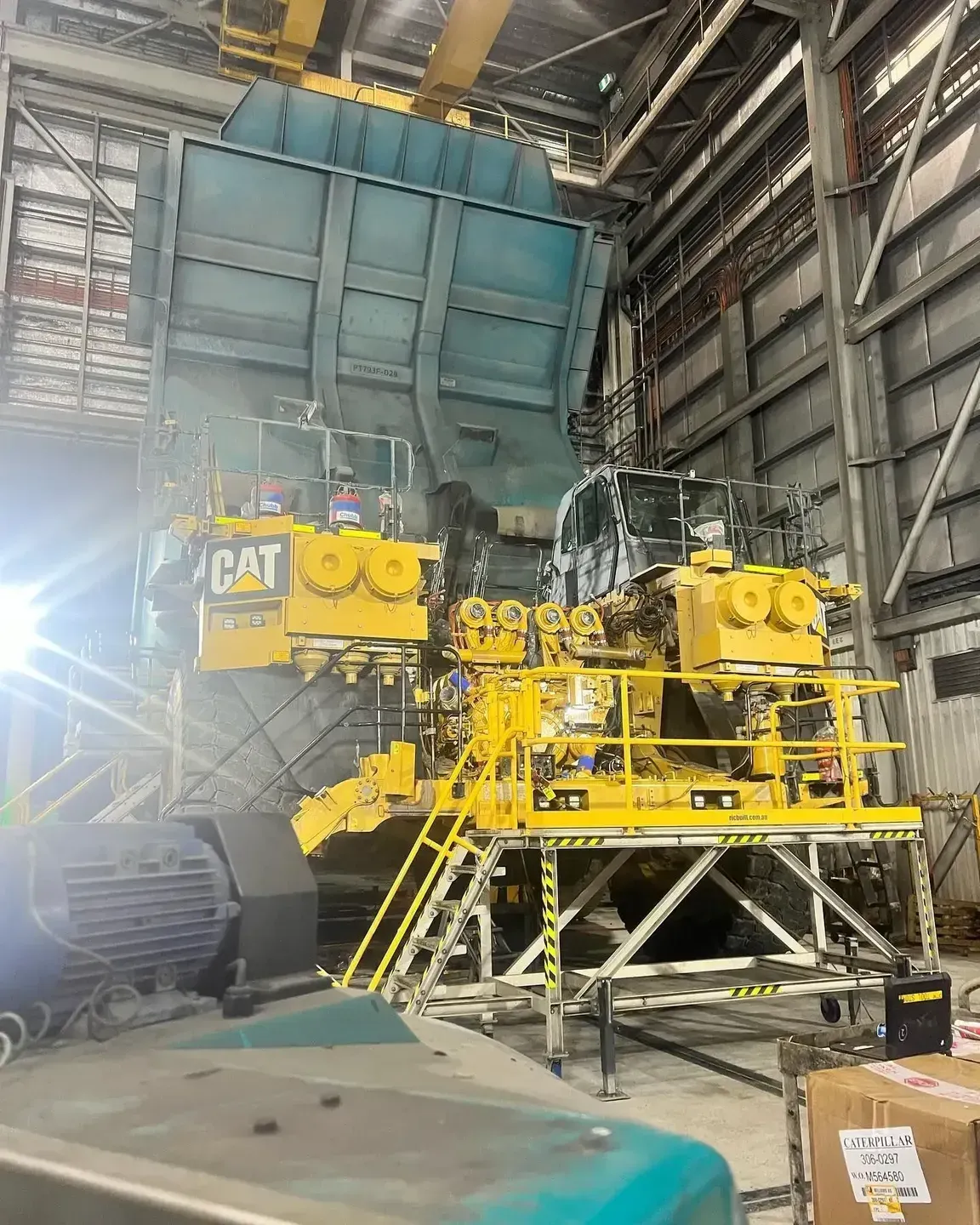 Large Yellow Industrial Machine With Cat Logo, Inside a Building — HOLESHOT Diesel In Gympie, QLD