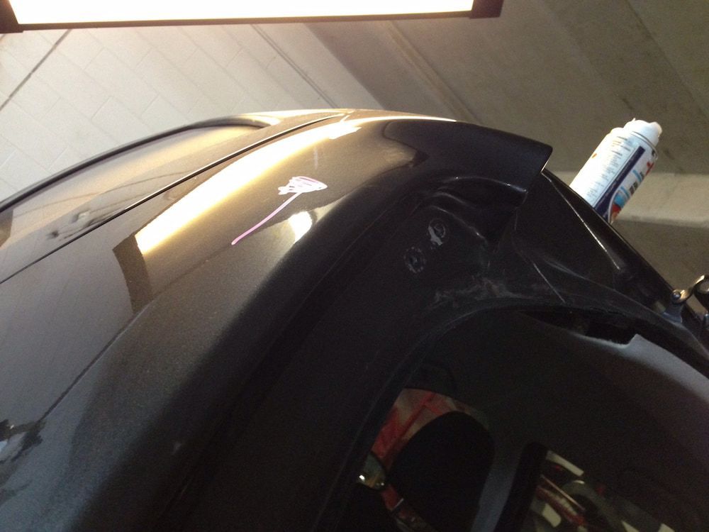 The Roof Of A Black Car Is Being Repaired — Rapid Auto Dent In West Gosford, NSW
