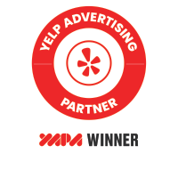 Yelp Advertising Partner Winner badge in red and white