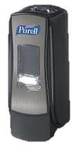 Se muestra un dispensador de desinfectante para manos Purell sobre un fondo blanco.