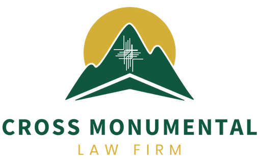Logo for Cross Monumental Law Firm: Green mountain silhouette with gold sunburst background, white cross design.