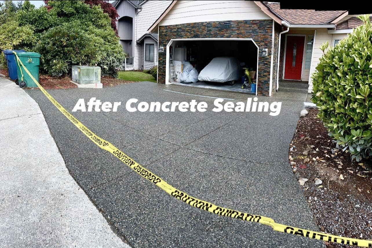Sealed concrete driveway next to house, caution tape, trash bins, car covered in garage.