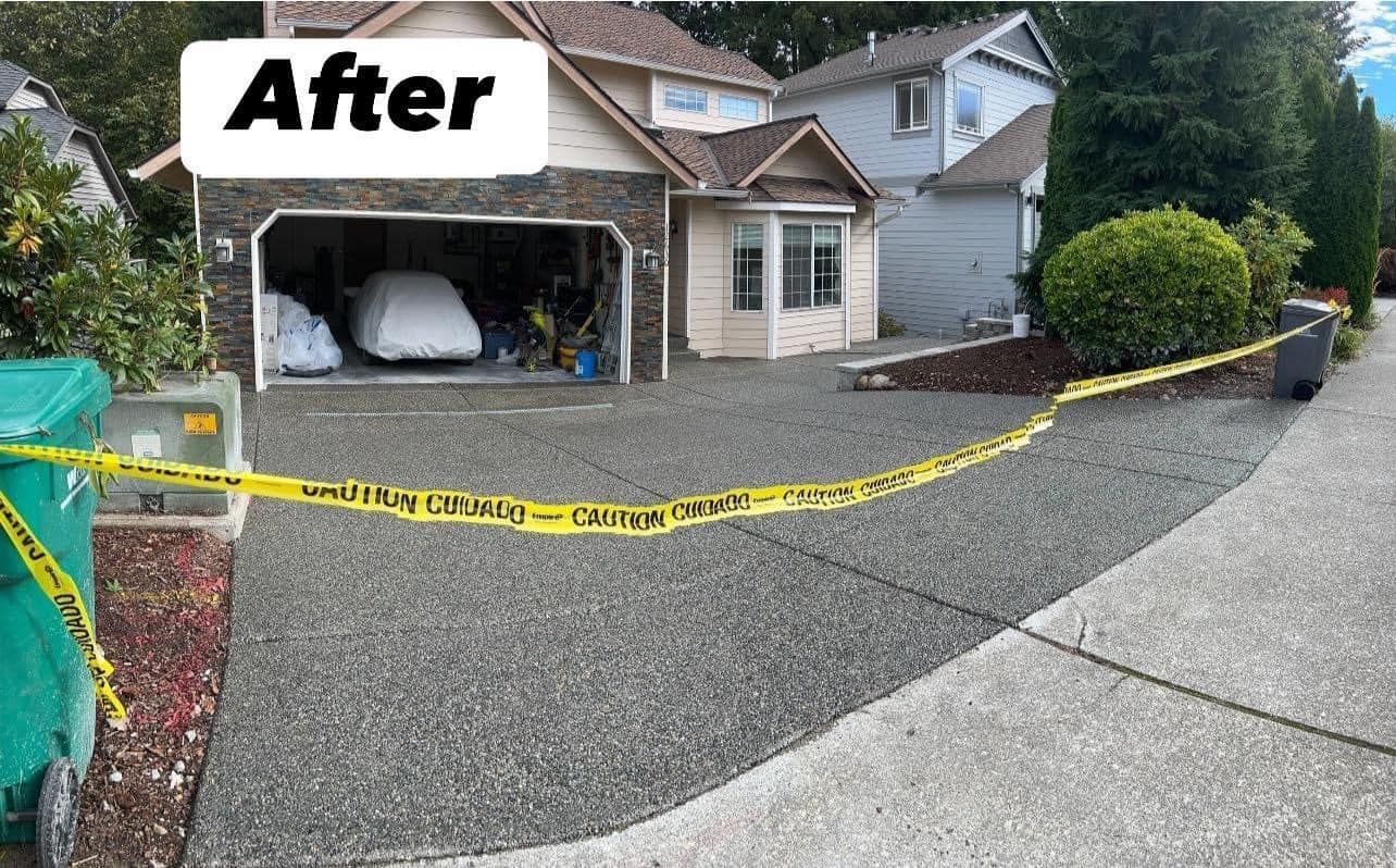 Gravel driveway and sidewalk with yellow caution tape in front of a house and garage.