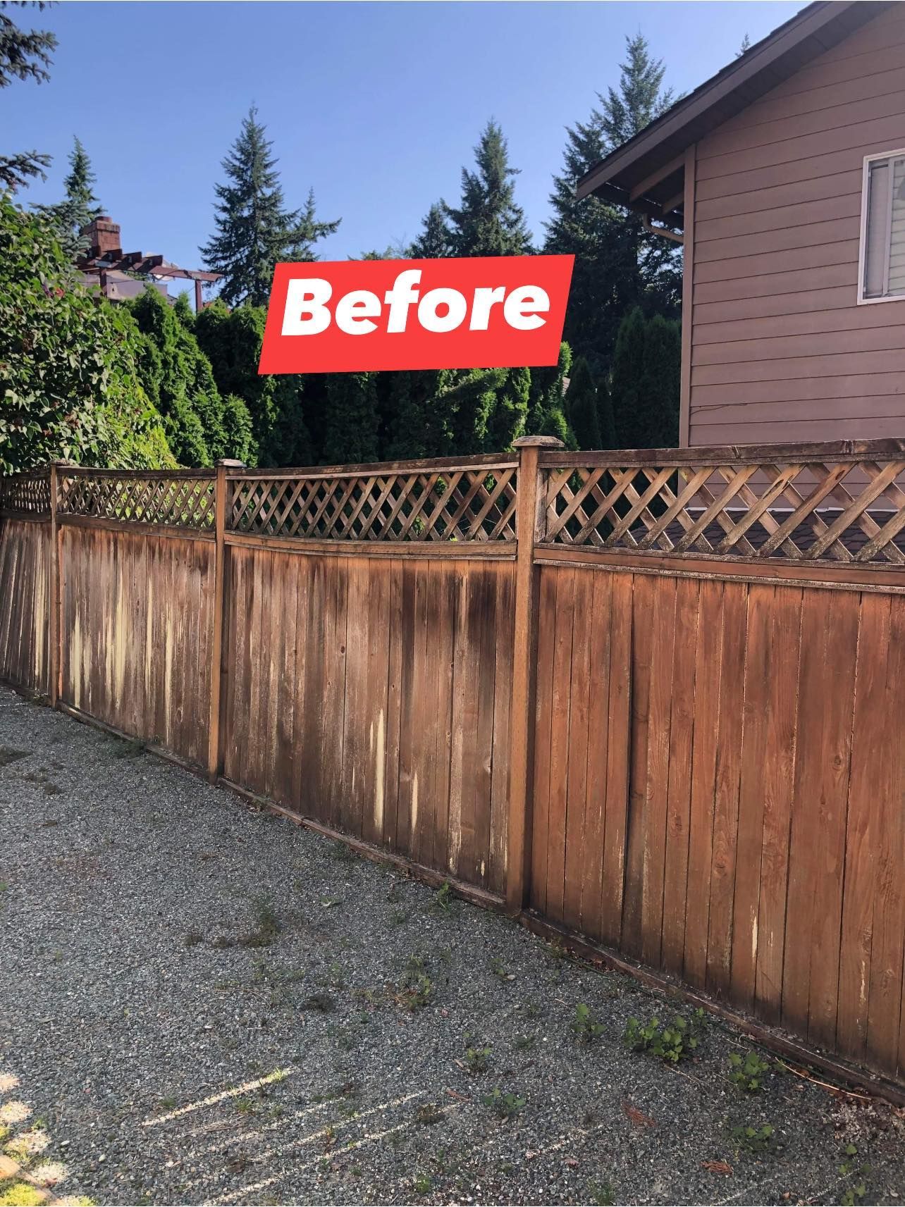 Wooden fence with weathered appearance, gravel driveway, and a house, with a 