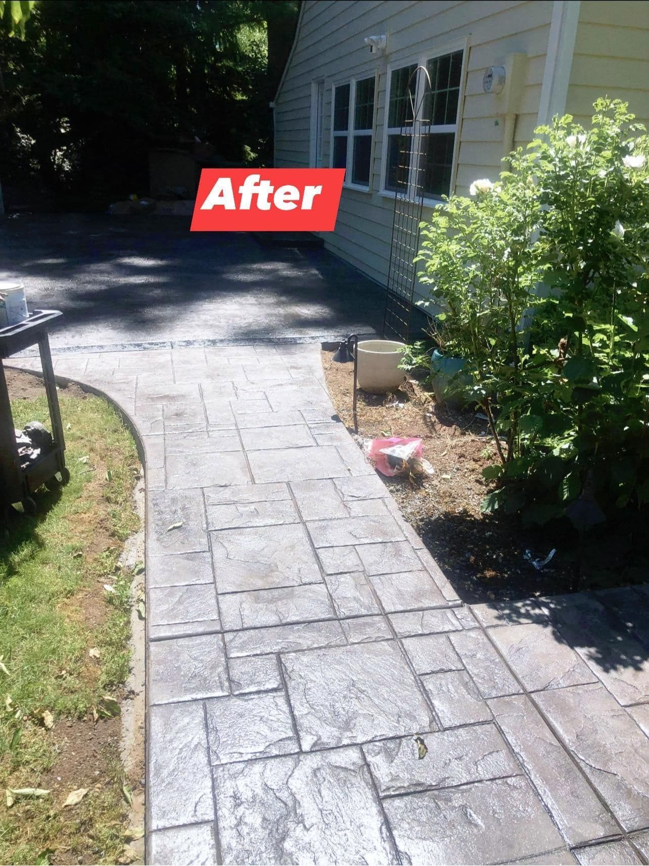 Stamped concrete walkway next to a building, lawn, and asphalt driveway; “After” text overlay.