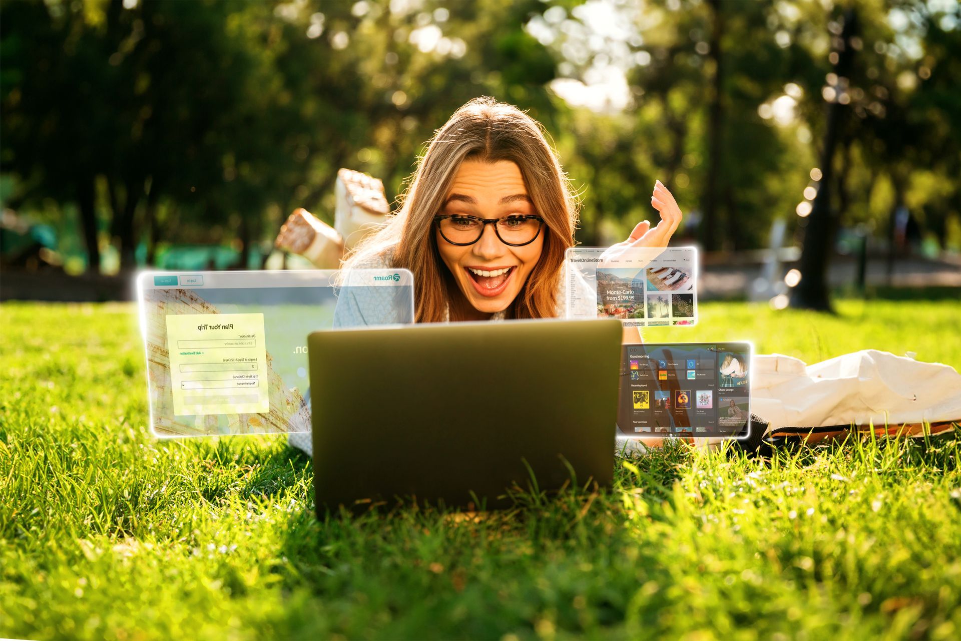 Woman smiling behind a laptop on the grass, surrounded by floating digital screens outdoors.