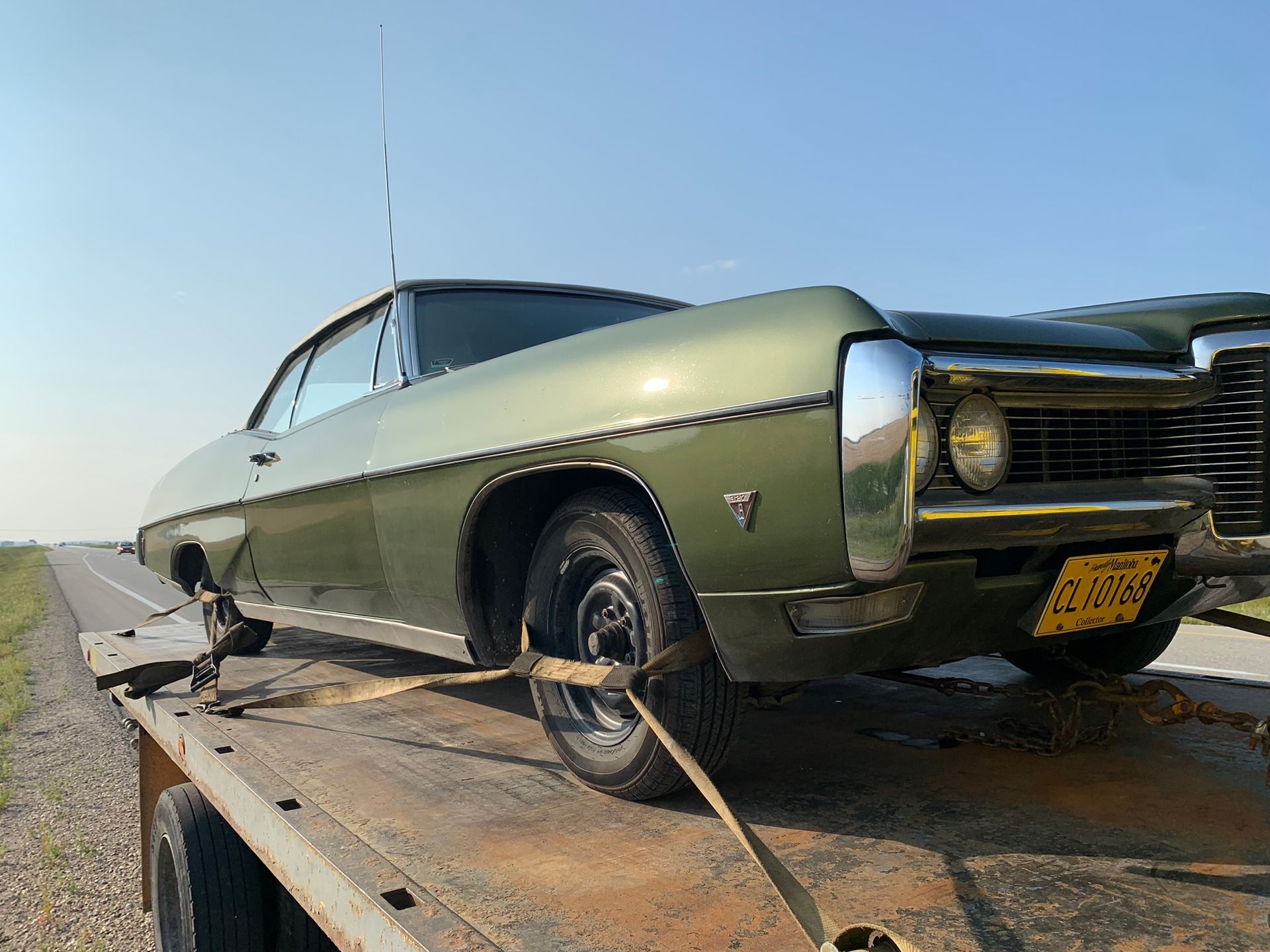 Towing specialty muscle car on Winnipeg highway