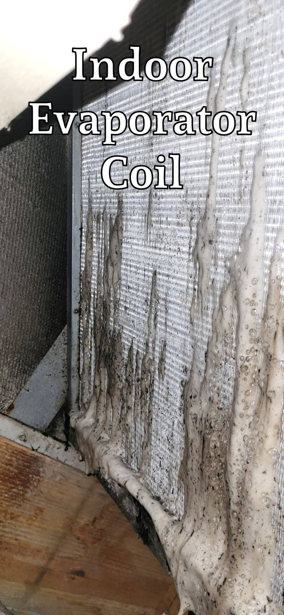 A close up of a dirty indoor evaporator coil.