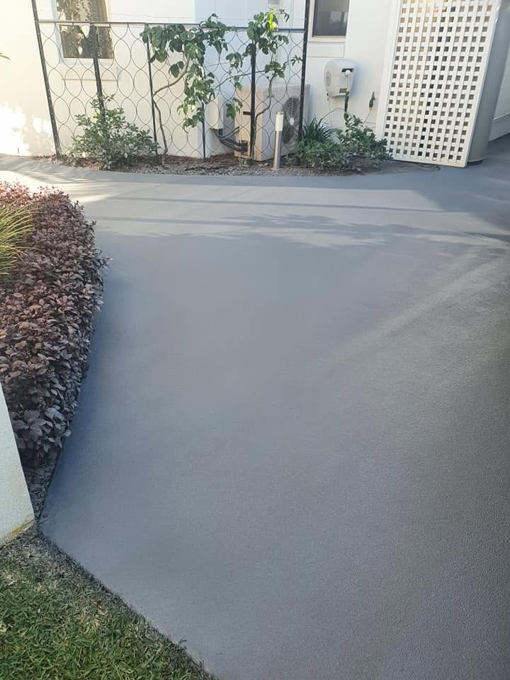 Smooth Gray Concrete Walkway Beside a Building — Mid North Coast Spray Pave in South West Rocks, NSW
