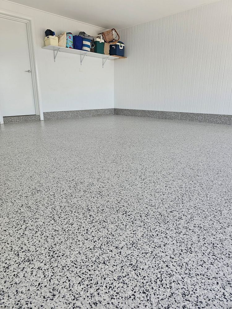 A Garage With a Shelf and a Ladder on the Wall — Mid North Coast Spray Pave in Mid North Coast, NSW