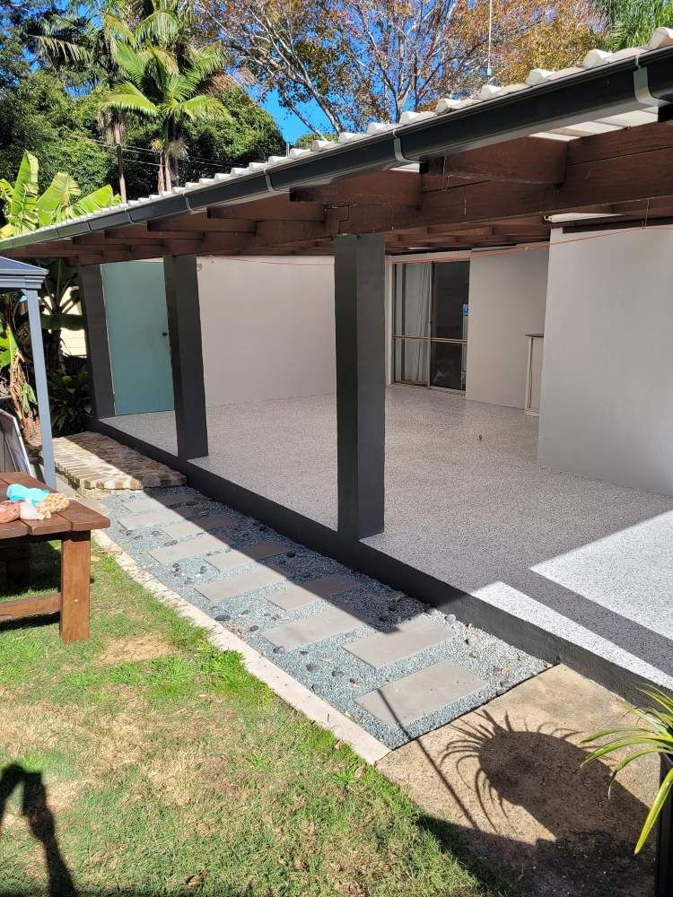 A House With a Covered Porch and a Bench in the Backyard — Mid North Coast Spray Pave in Port Macquarie, NSW