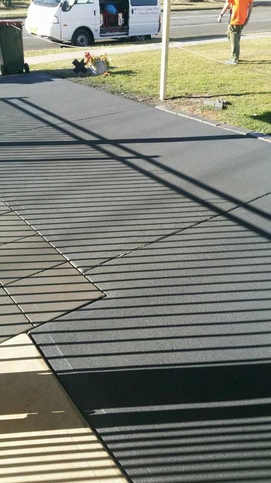 A White Van is Parked on the Side of the Road — Mid North Coast Spray Pave in Port Macquarie, NSW