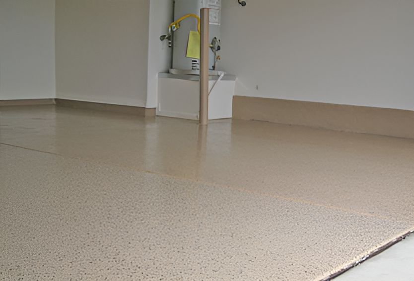 A Garage With a Concrete Floor and White Walls — Mid North Coast Spray Pave in Port Macquarie, NSW