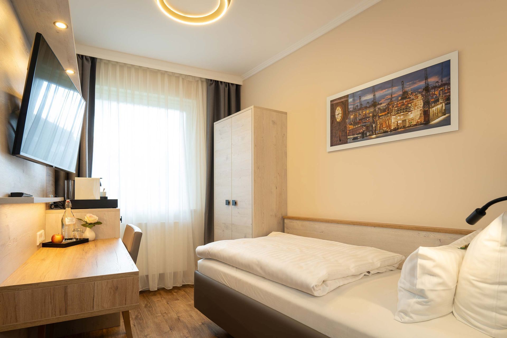 Einzelzimmer zum Garten in Hamburg im Boutique Hotel Rosengarten im Alstertal in der Region Wellingsbüttel / Poppenbüttel.
