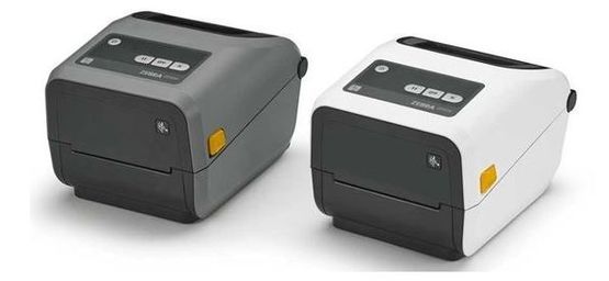 Deux imprimantes d'étiquettes de bureau, une grise, une blanche, avec des façades noires et des accents jaunes.