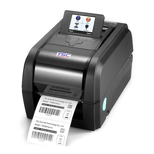 Imprimante d'étiquettes thermiques Black TSC avec écran LCD, imprimant une bande d'étiquettes avec codes-barres et texte.