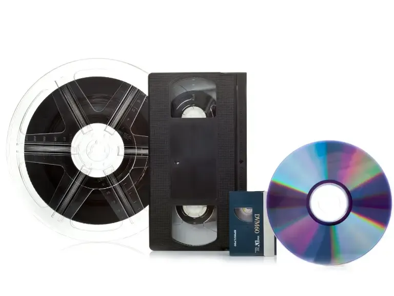 A vhs tape a cd and a reel of film