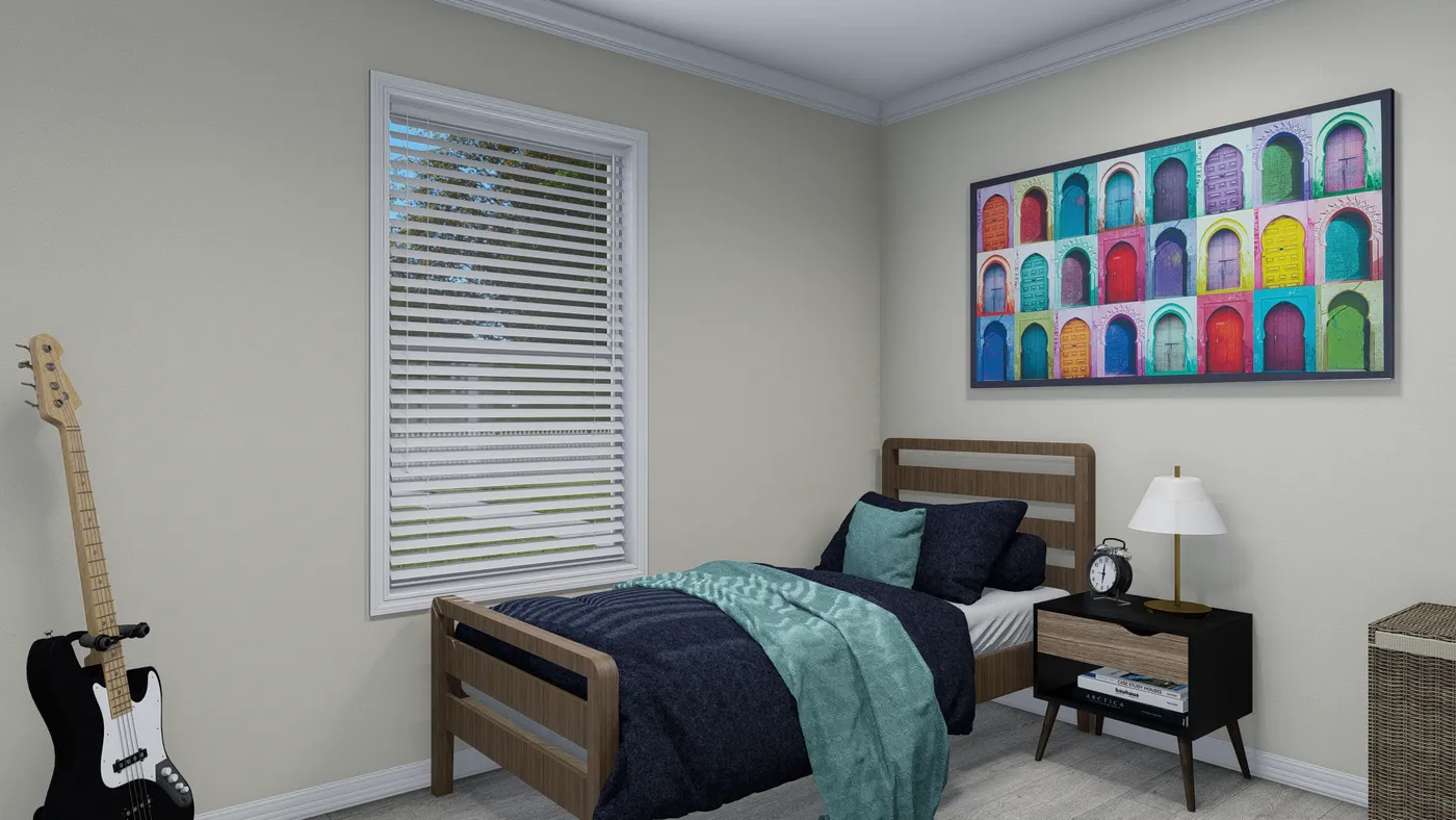 Bedroom with bed, guitar, artwork, window, and nightstand. Blue and teal bedding, cream walls, and wood furniture.