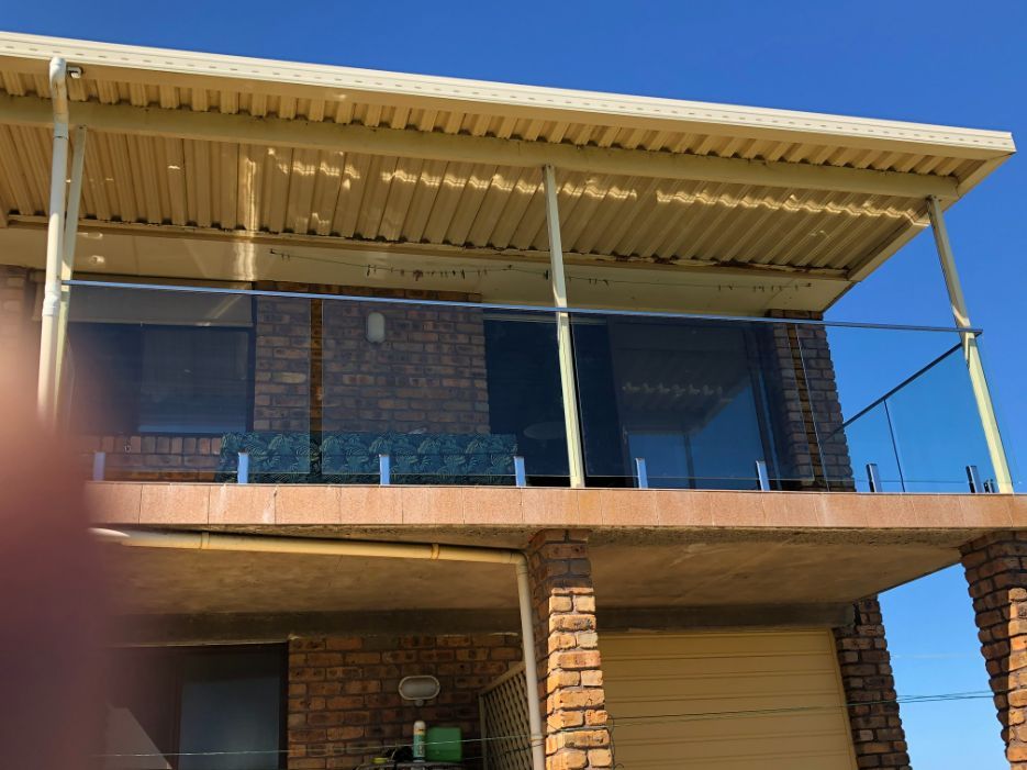 House with Blacony — Pool Fences in Taree South, NSW