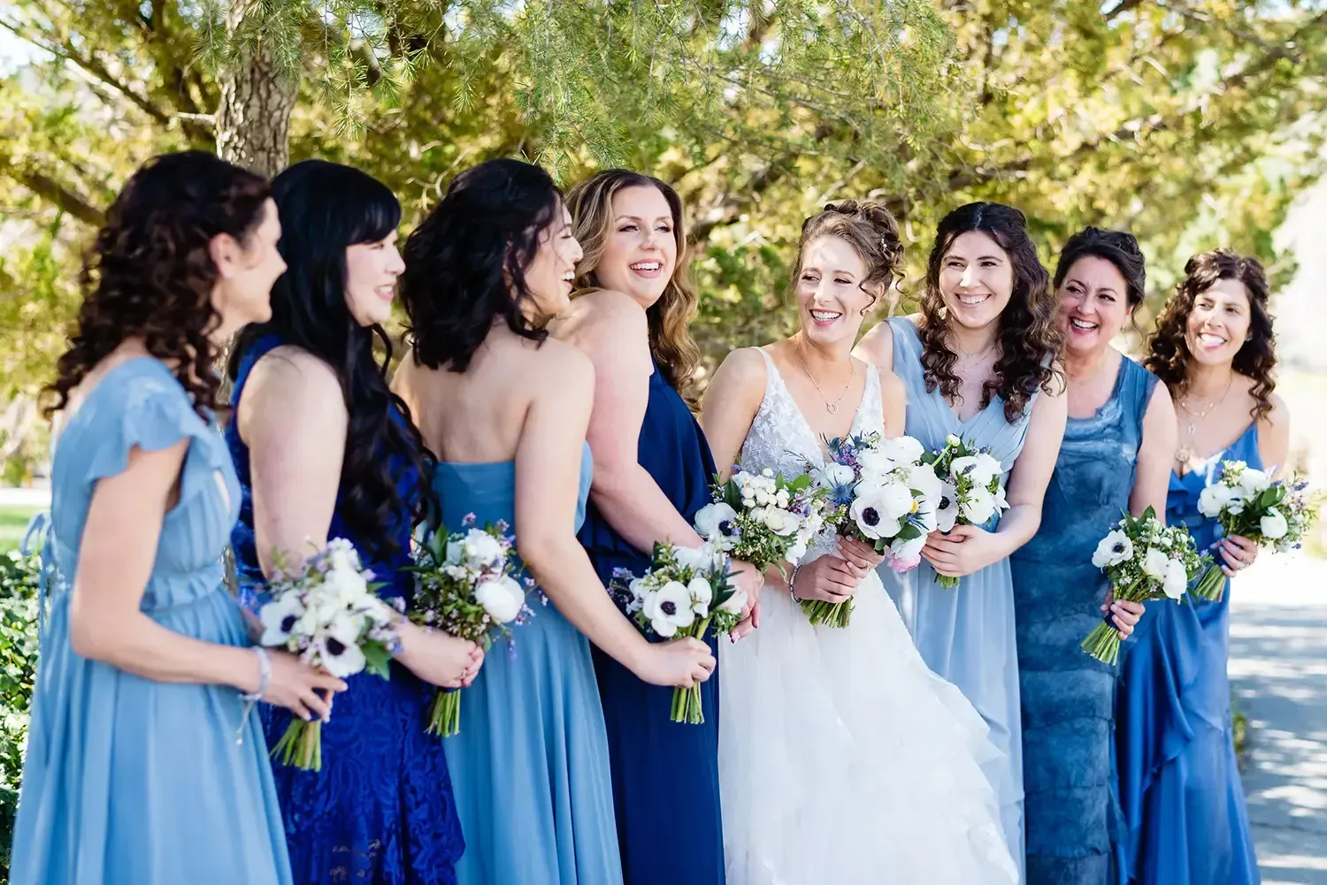 Bridal hair and makeup featuring soft waves and timeless glam