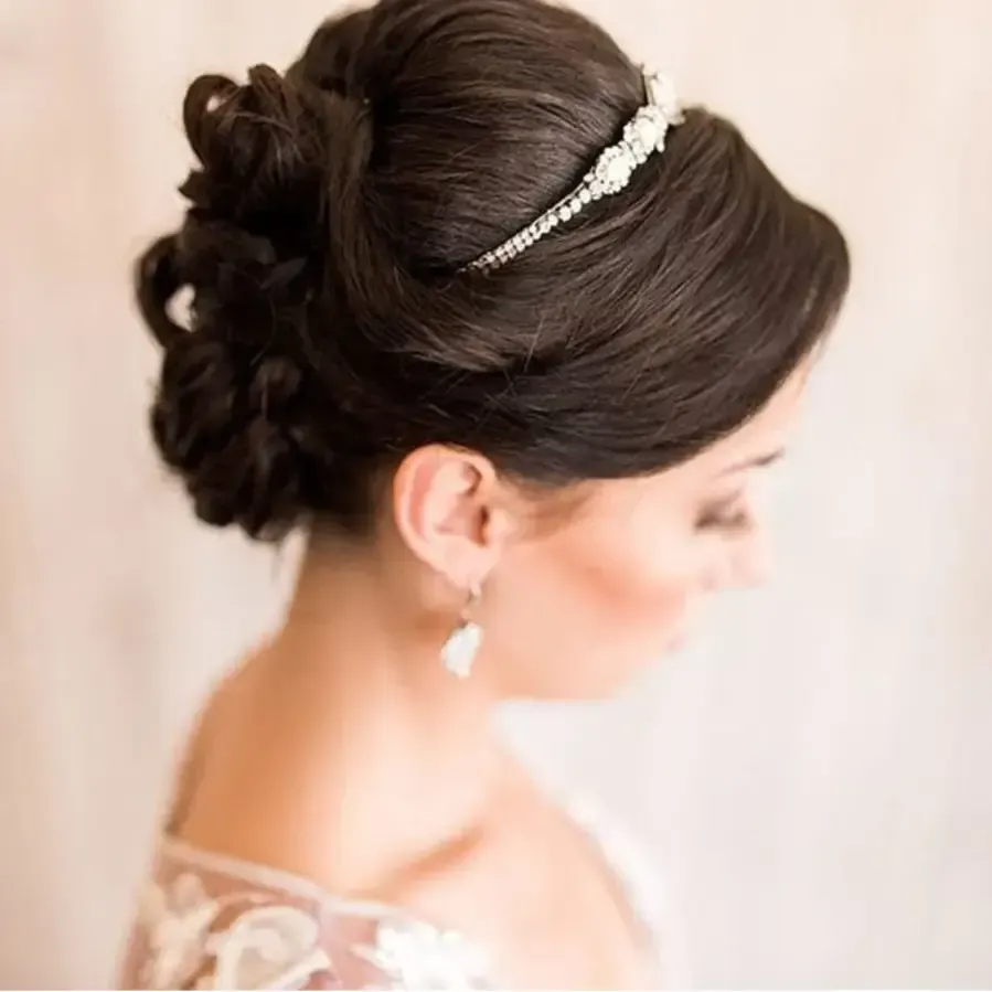 Bride with textured bun and subtle makeup