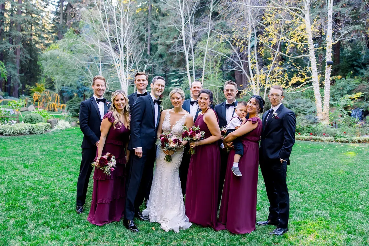 Bridal party with coordinated hairstyles and soft glam makeup