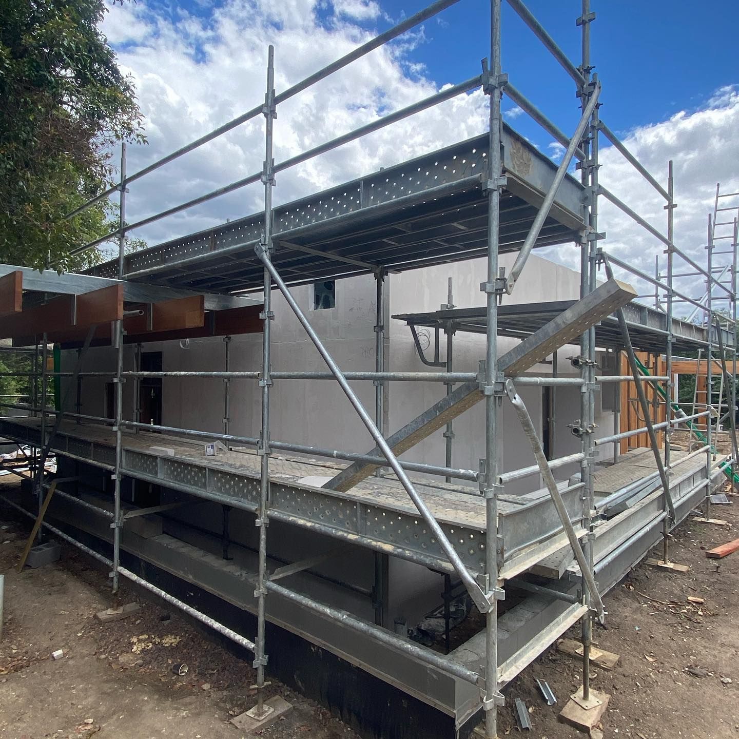 A building is being built with scaffolding around it.