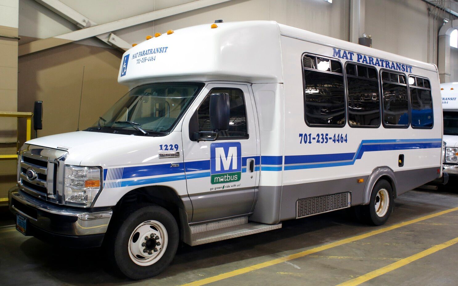 Matbus Paratransit bus parked in a garage