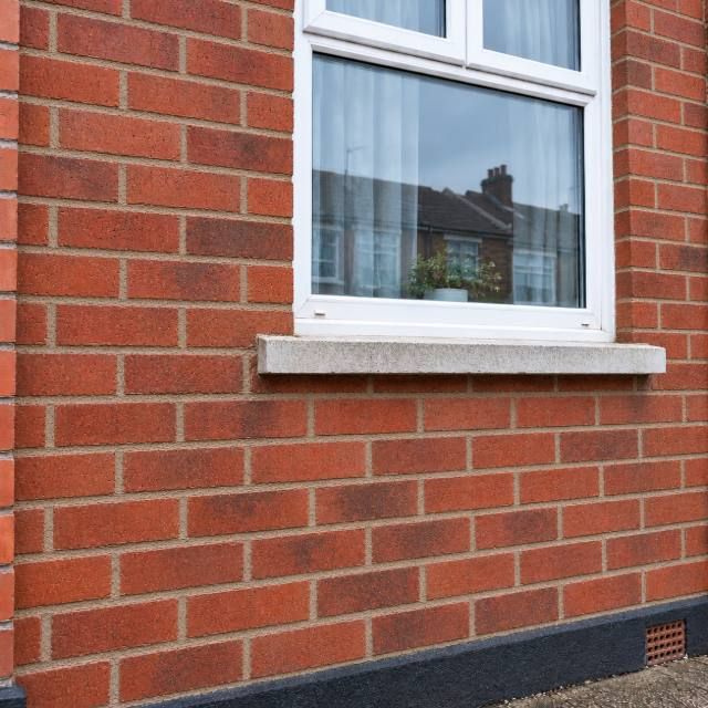 Valley-side stone wall before and after repointing after