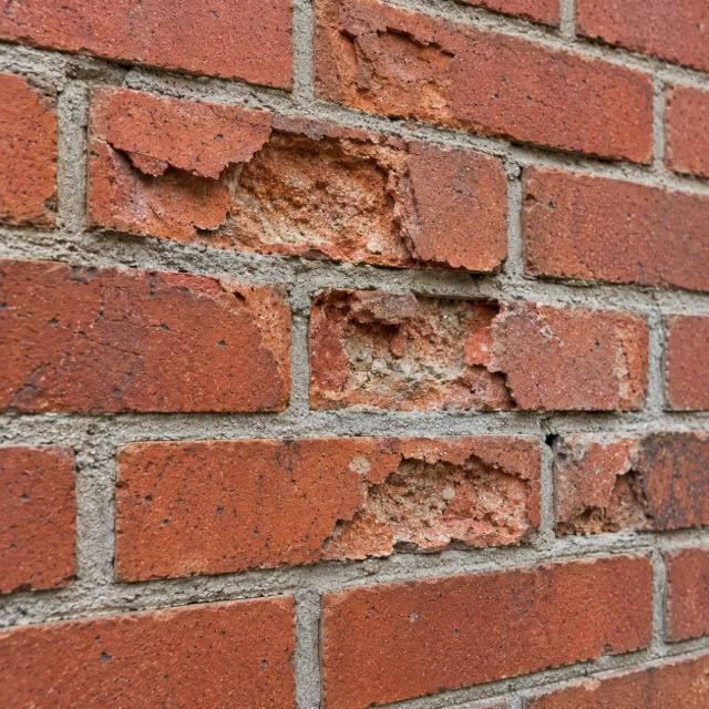 Damaged brick repair before