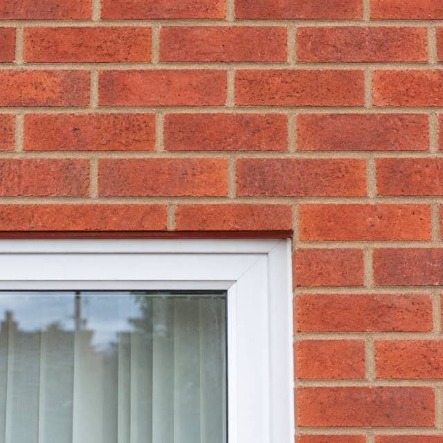 Brick wall over an opening repaired after lintel failure after