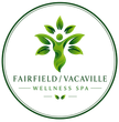 A logo for fairfield wellness spa with flowers around it