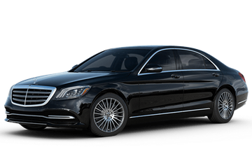 Black luxury sedan on a white background